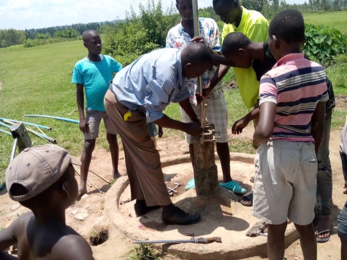 The local team repairs a water pump, water project 2023.